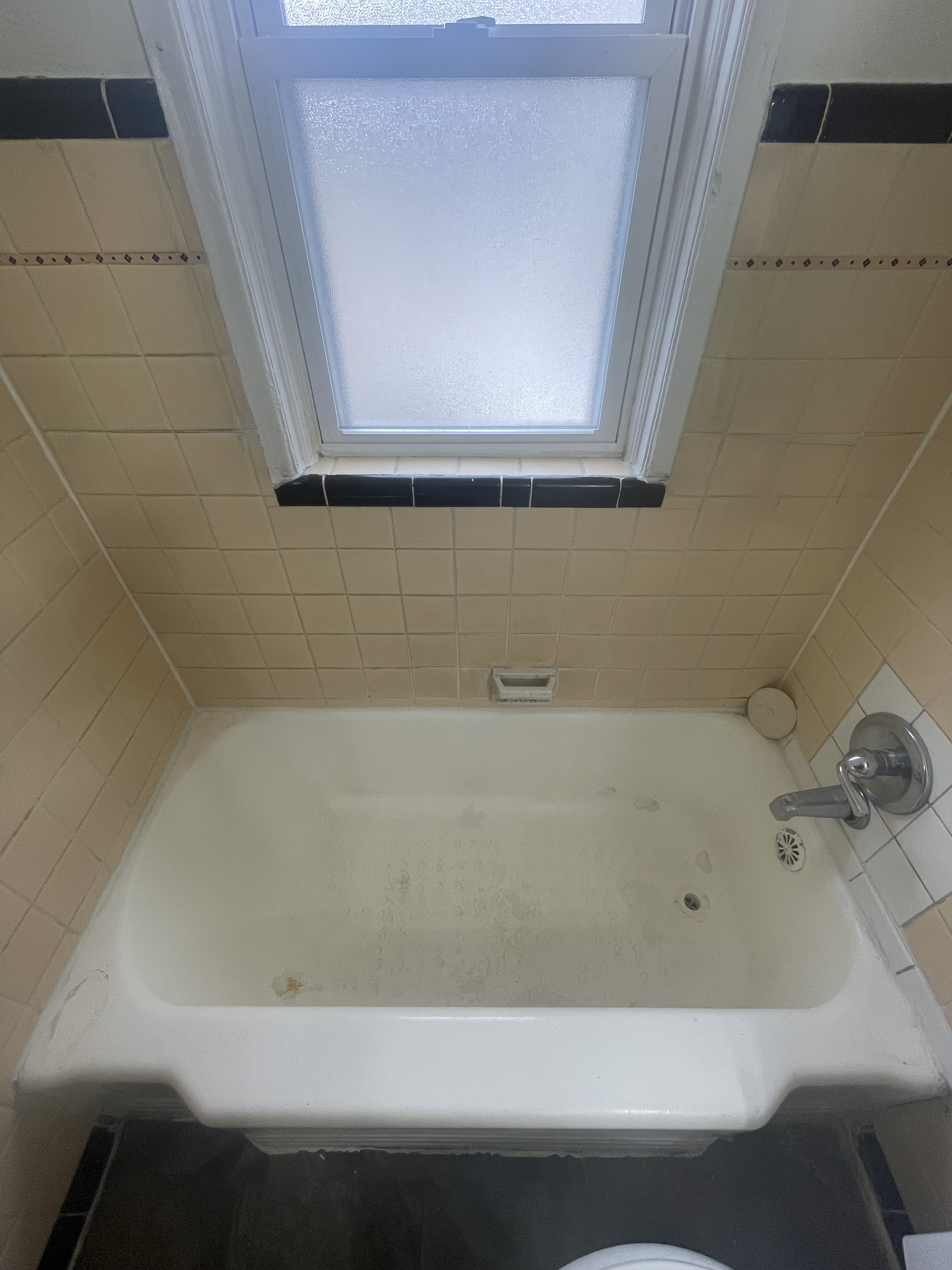 Bathtub before refinishing