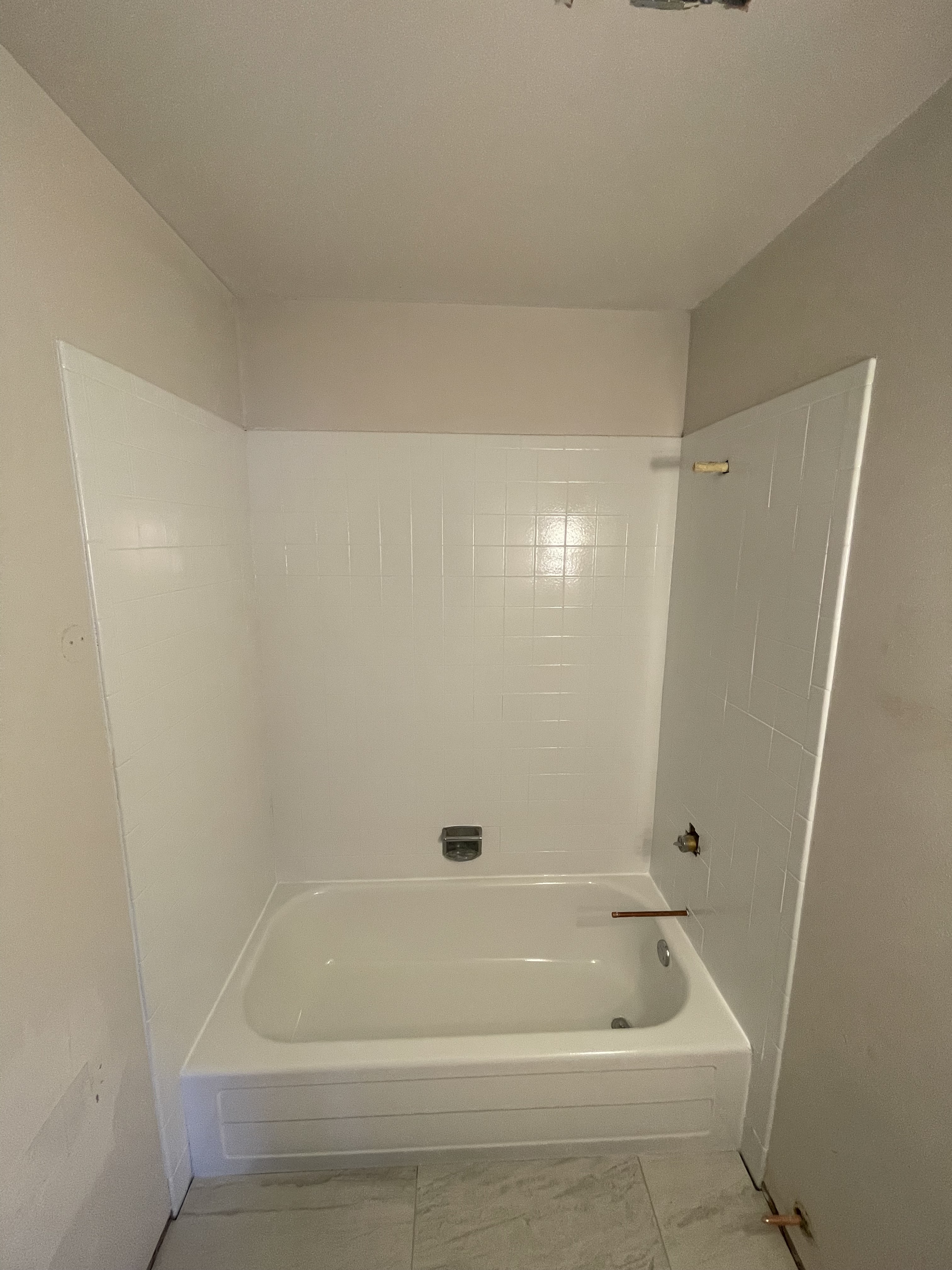 Tub and tile surround after refinishing